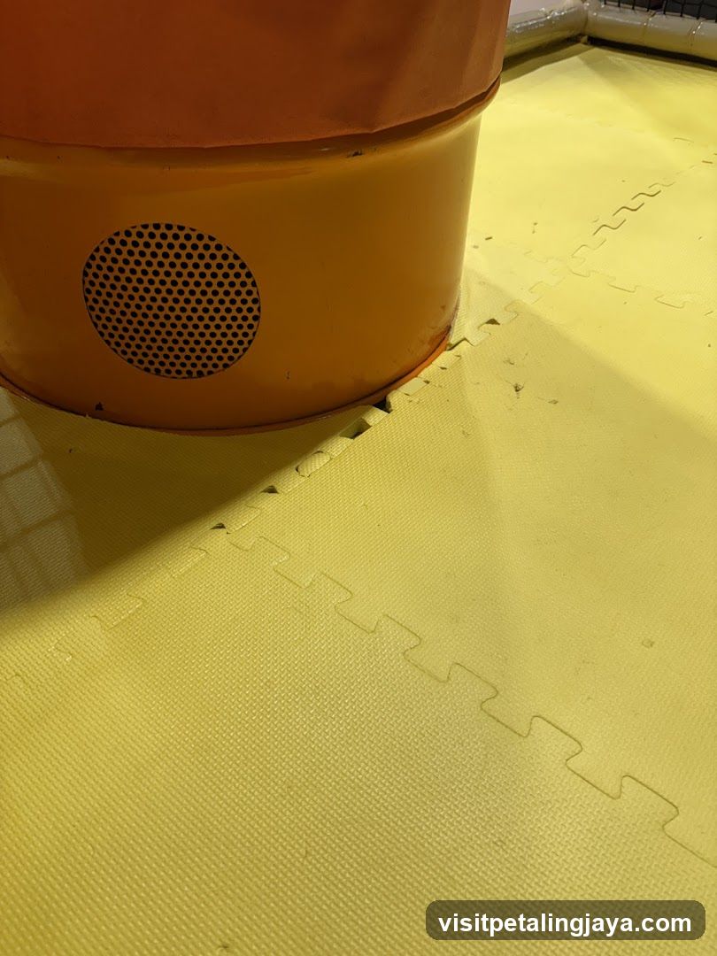 Yellow foam mat with orange container