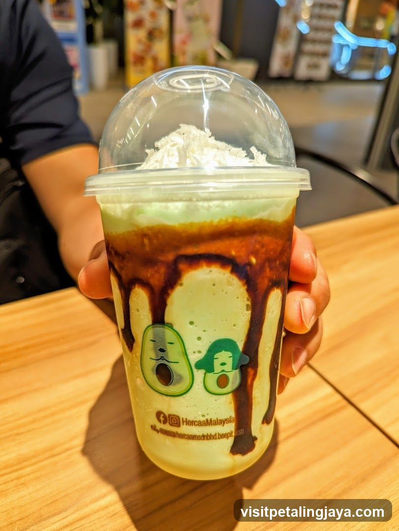 Avocado-themed drink with chocolate drizzle