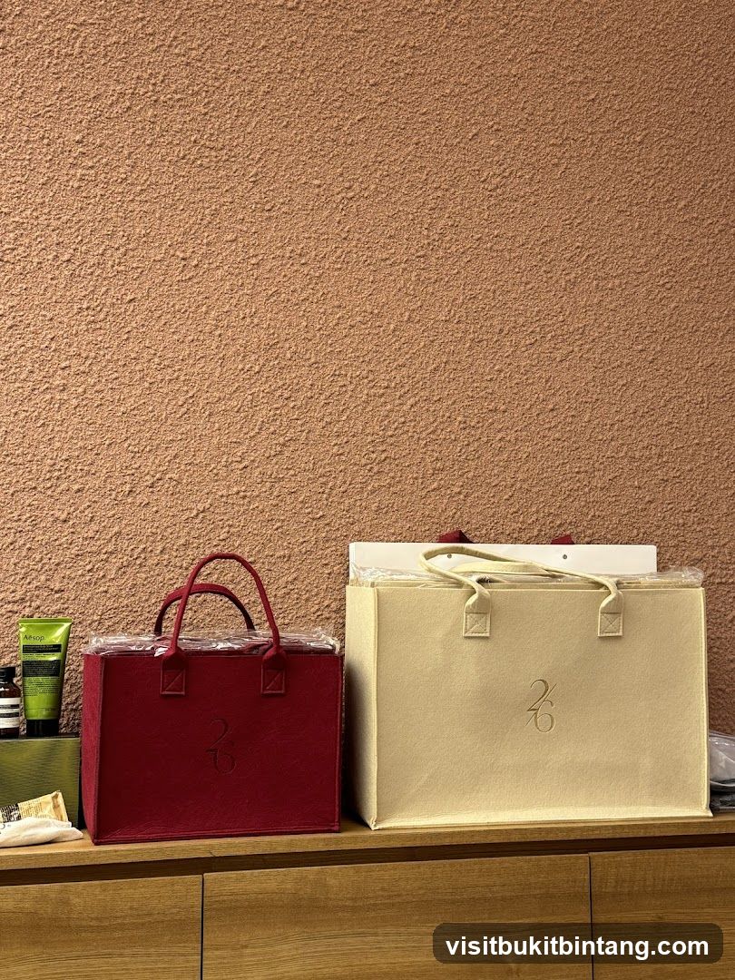 Two branded tote bags