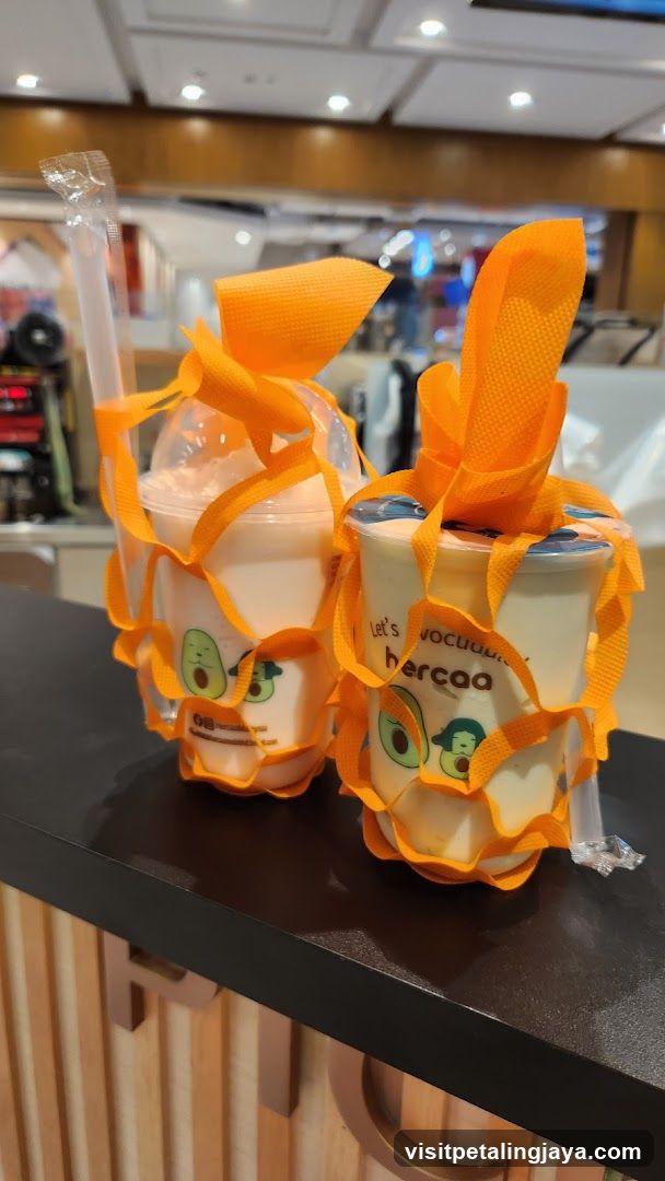 Avocado-themed drinks with orange packaging