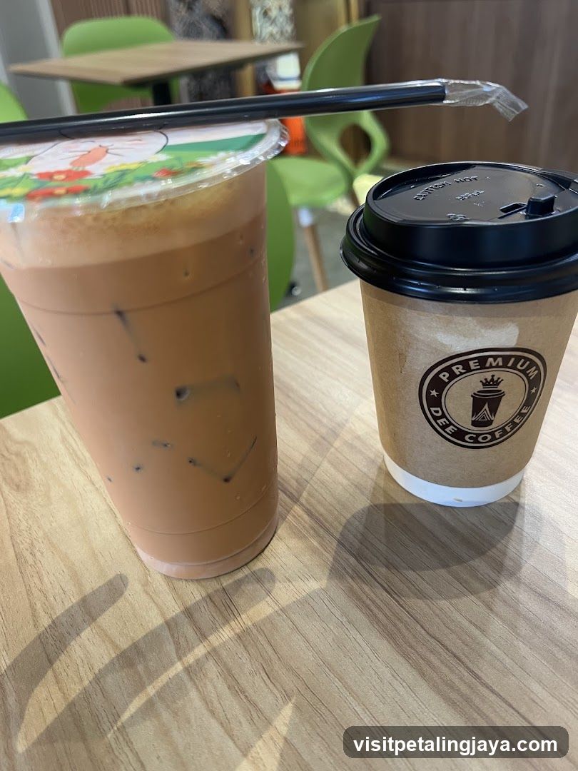 Coffee and Iced Drink on Table