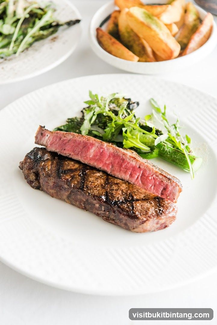 Grilled Steak with Salad and Fries