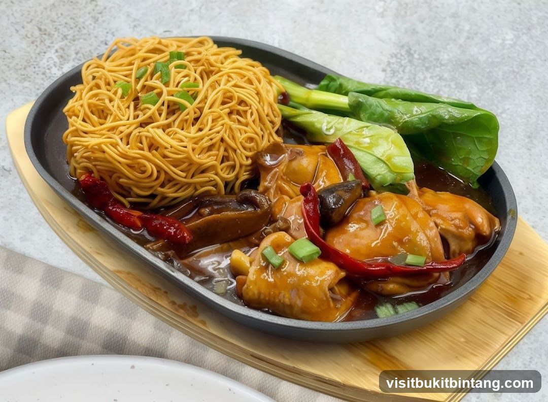 Sizzling Chicken with Noodles