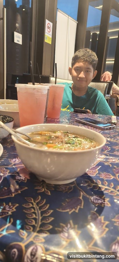 Boy at Restaurant Table