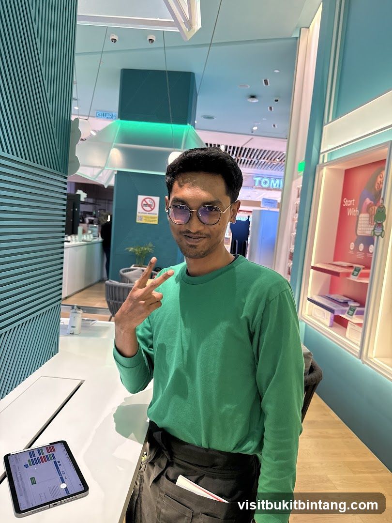 Man in Green Shirt Posing in Store