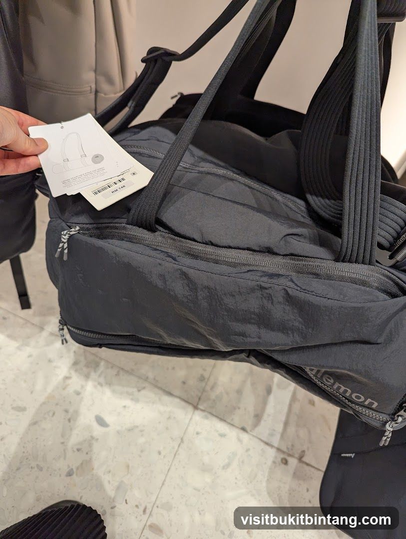 Black Duffel Bag with Tag