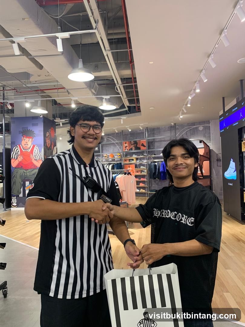 Two men shaking hands in a store