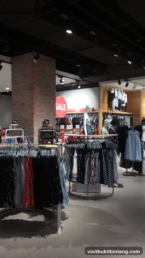 Clothing store interior with sale display