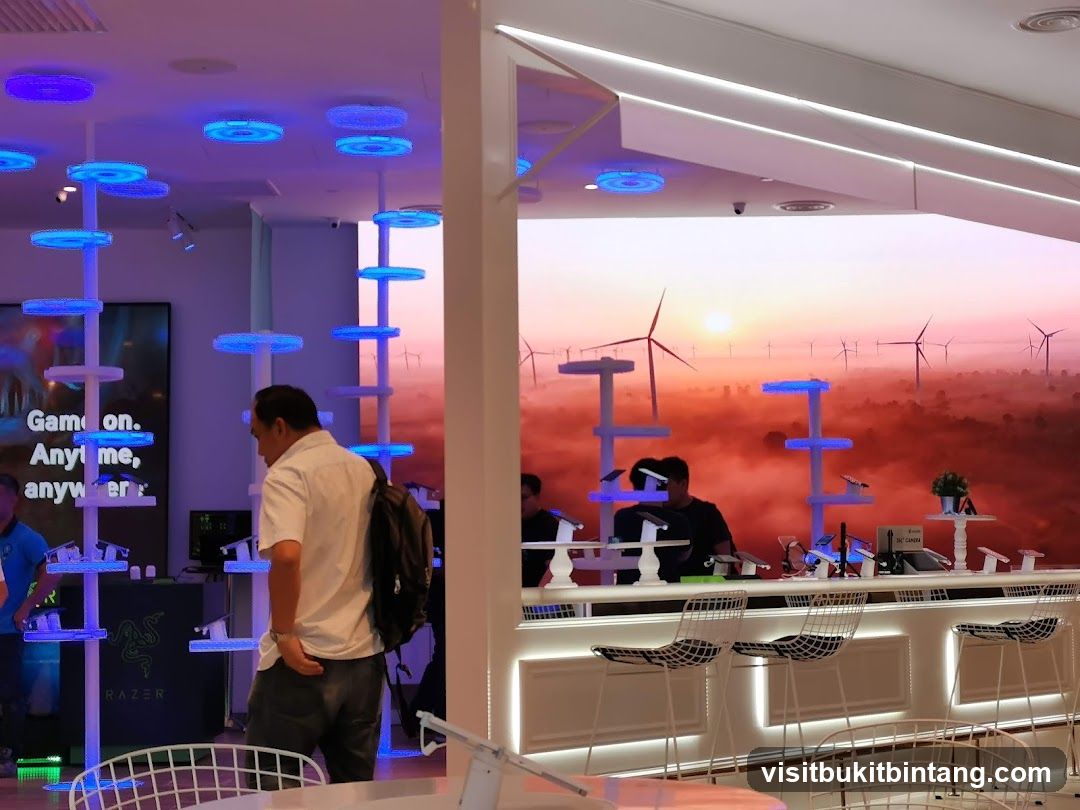 Modern electronics store with display shelves and a scenic backdrop