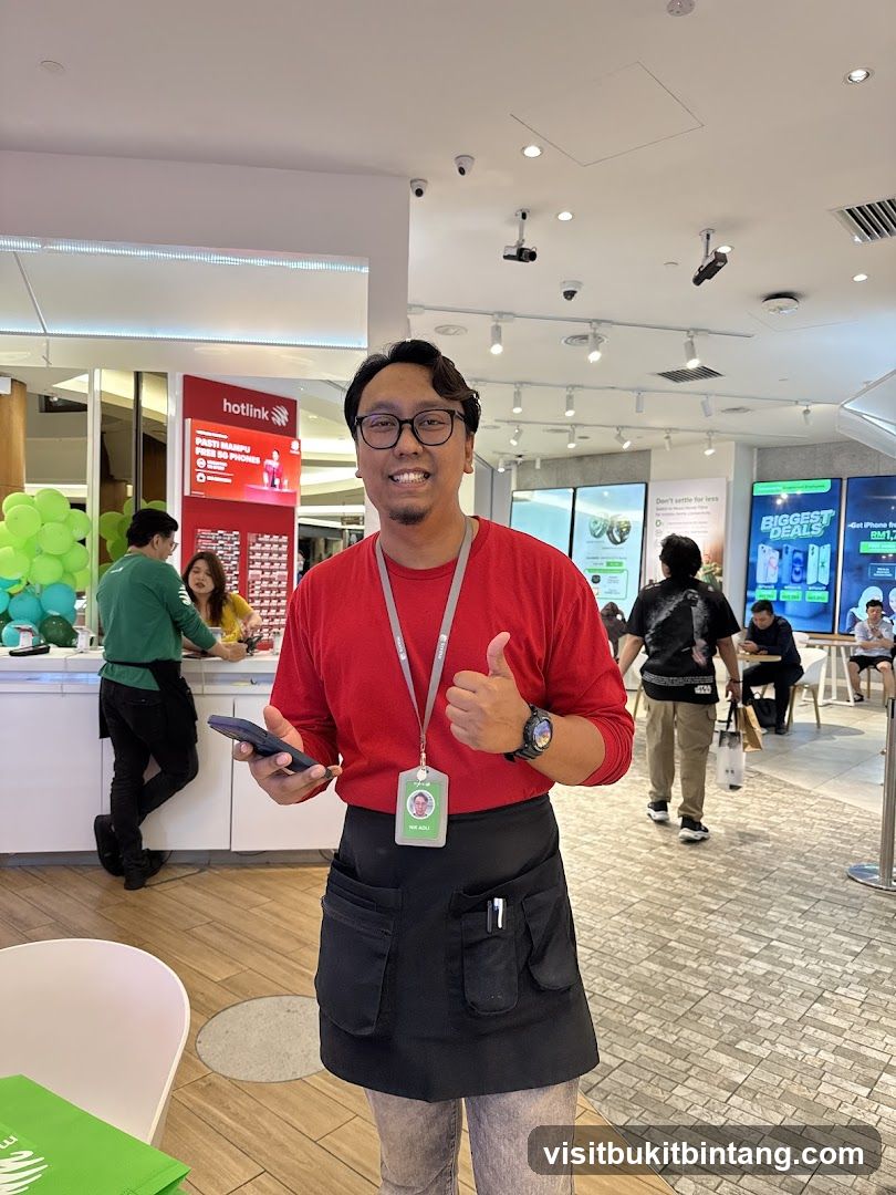 Store employee giving a thumbs up