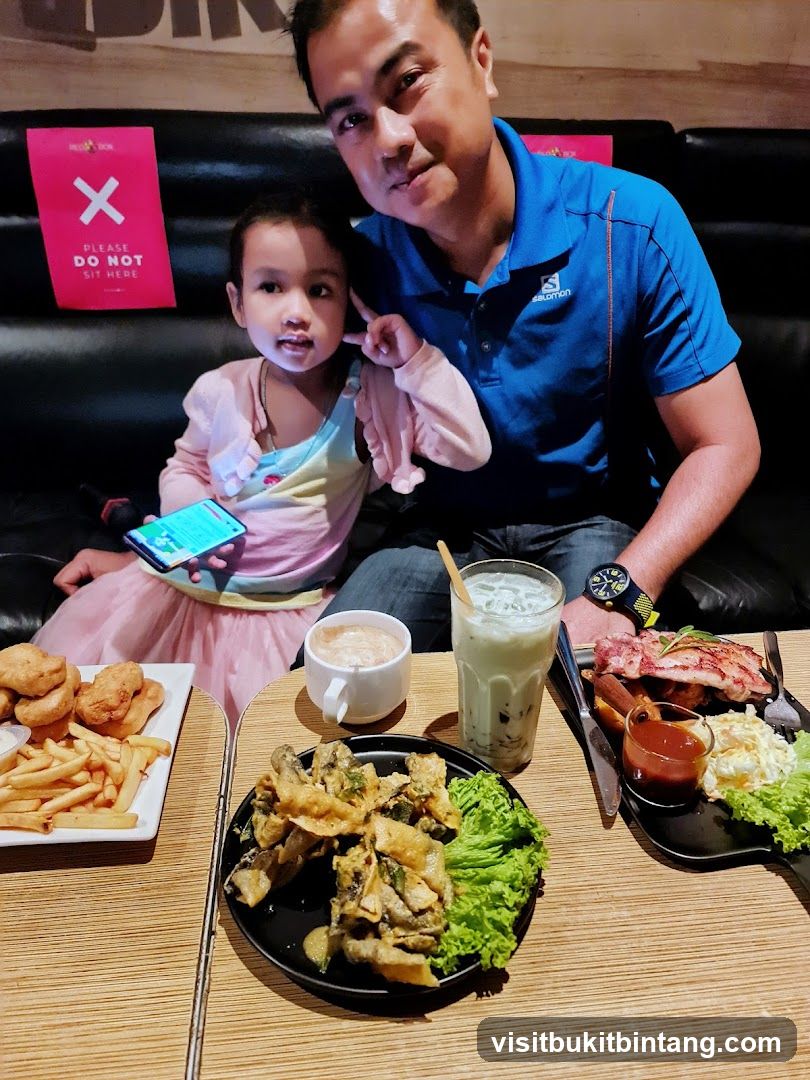 Father and Daughter Enjoying a Meal
