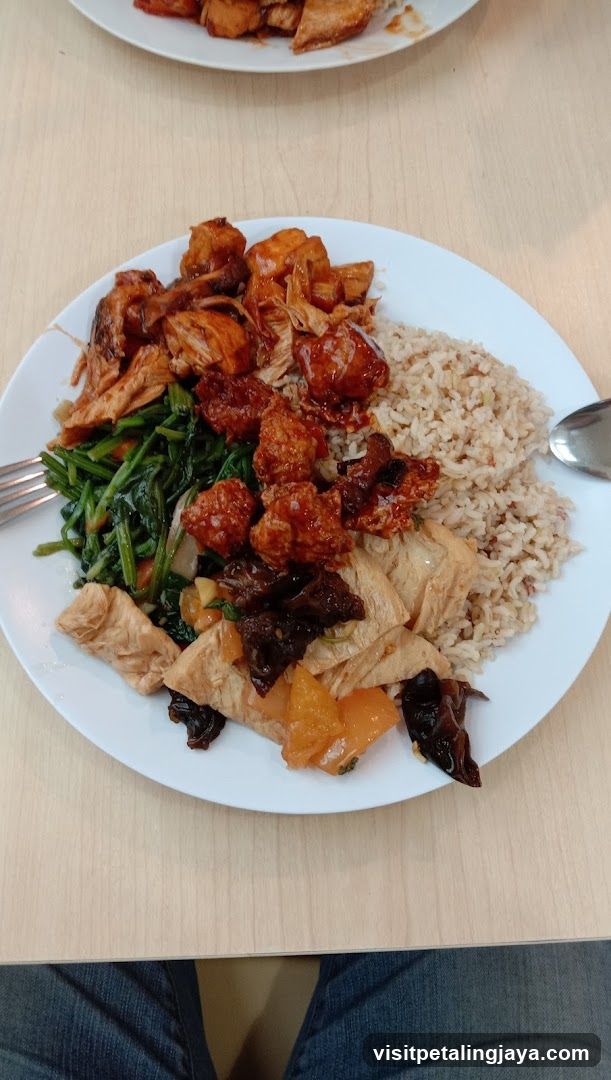 Plate of Chinese-style food with rice