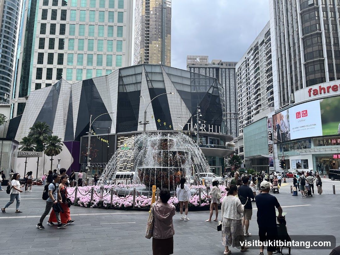 Outdoor plaza with fountain and surrounding buildings