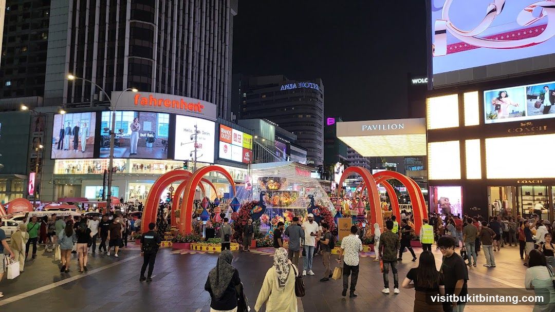 Nighttime street scene with festive decorations