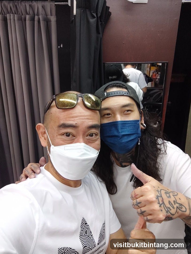 Two men posing for a selfie
