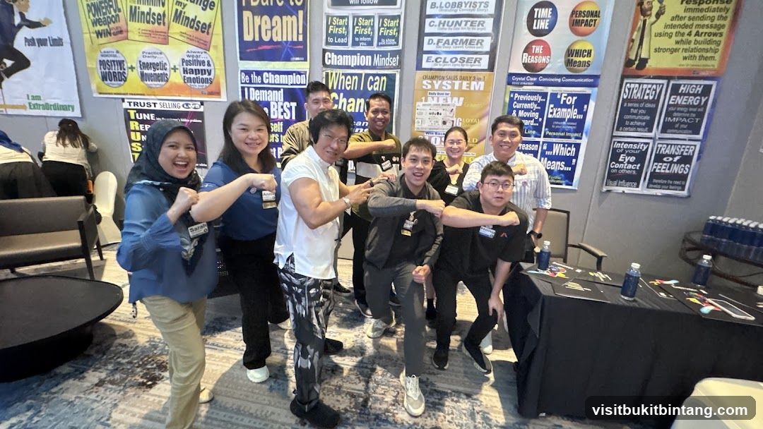 Group posing with motivational posters