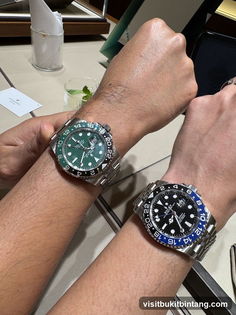 Two watches on wrists