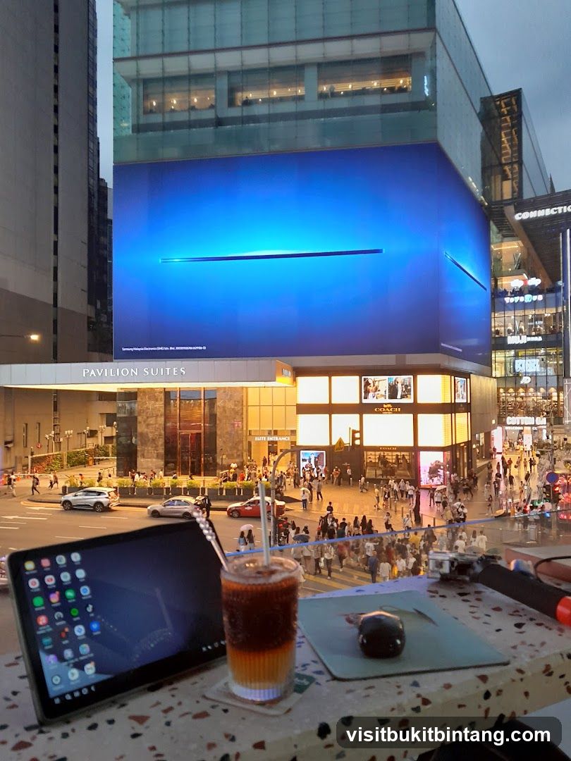 Cityscape with Digital Billboard and Outdoor Cafe