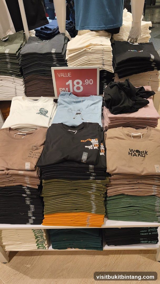T-shirt display with sale sign