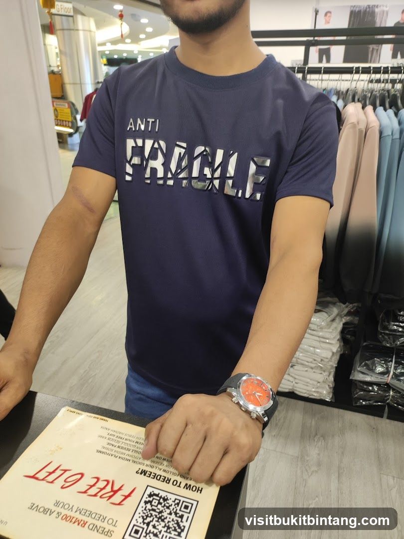 Man in T-shirt with "Anti Fragile" print