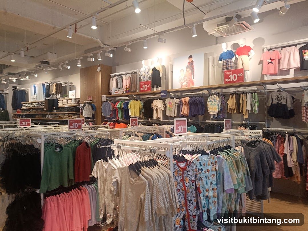 Clothing store interior with racks of apparel
