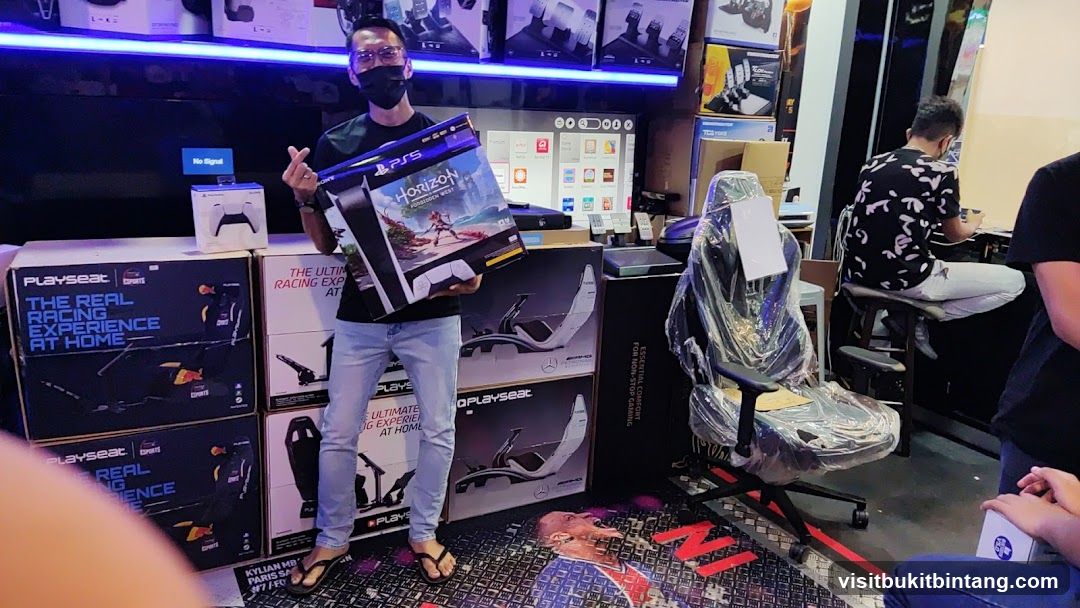 Gamer holding a PlayStation 5 game