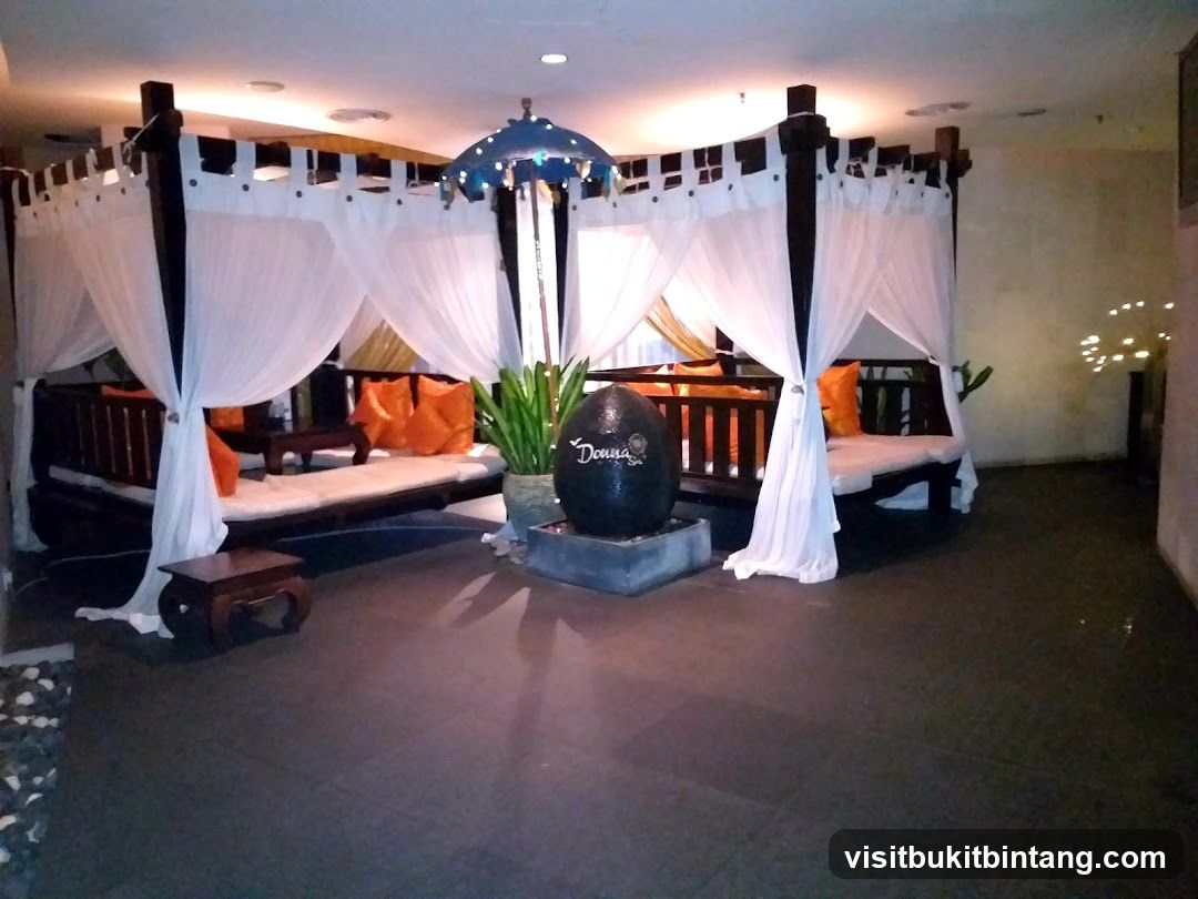 Relaxation Area with Daybeds and Water Feature
