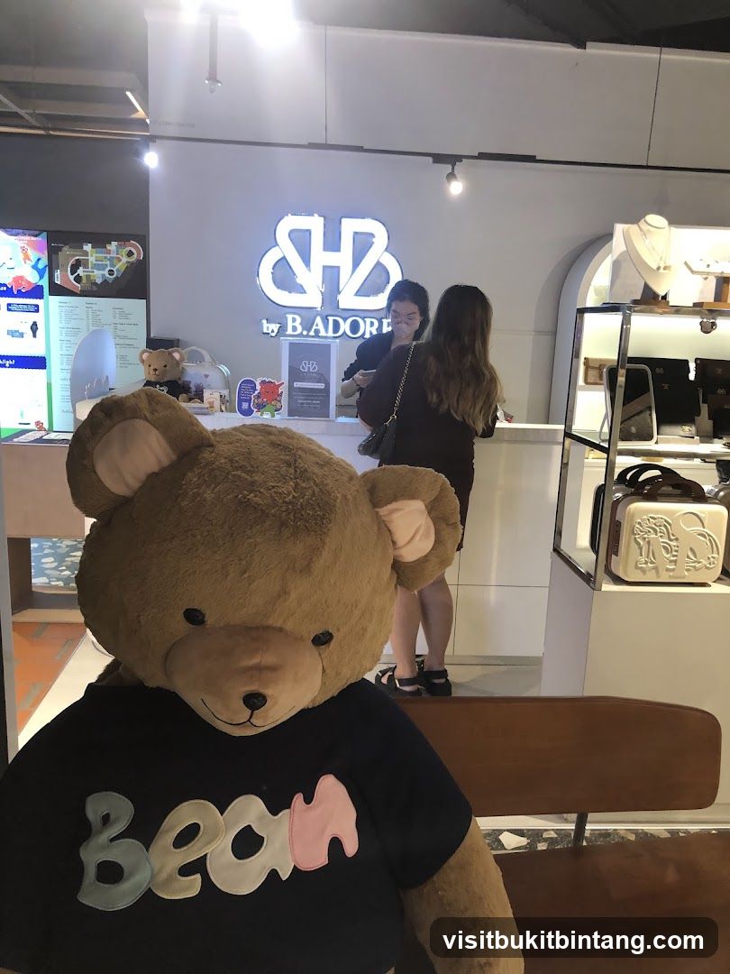 Giant teddy bear in front of a store counter