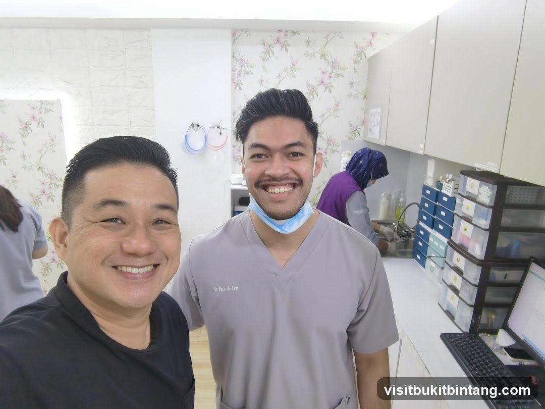 Two men smiling in a clinic