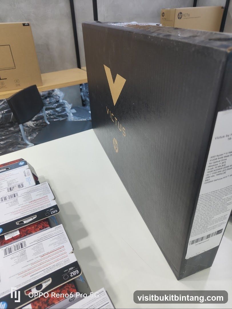 HP Victus Laptop Box and Ink Cartridges