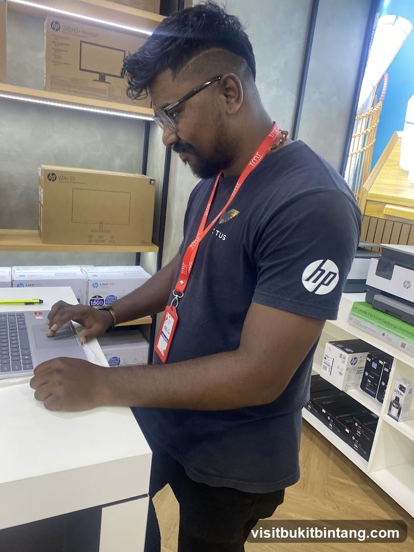 Man working in electronics store