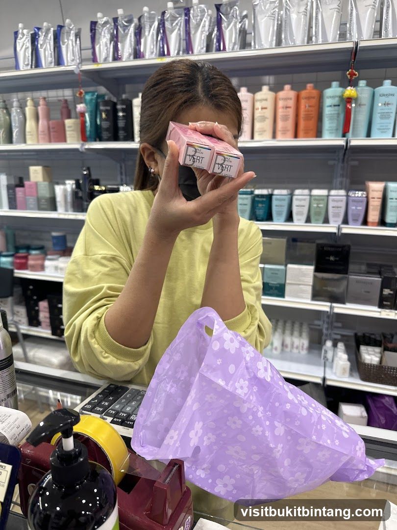 Woman holding product boxes