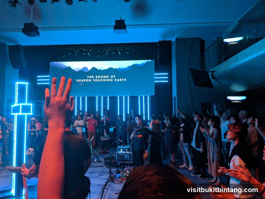 Congregation raising hands during a service
