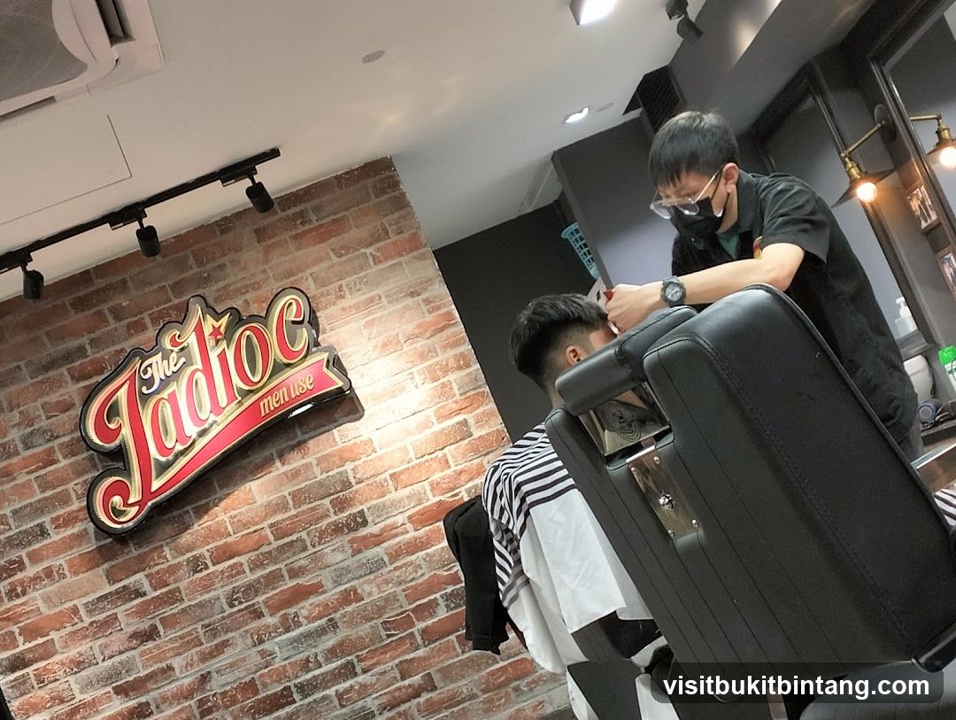 Barber cutting client's hair