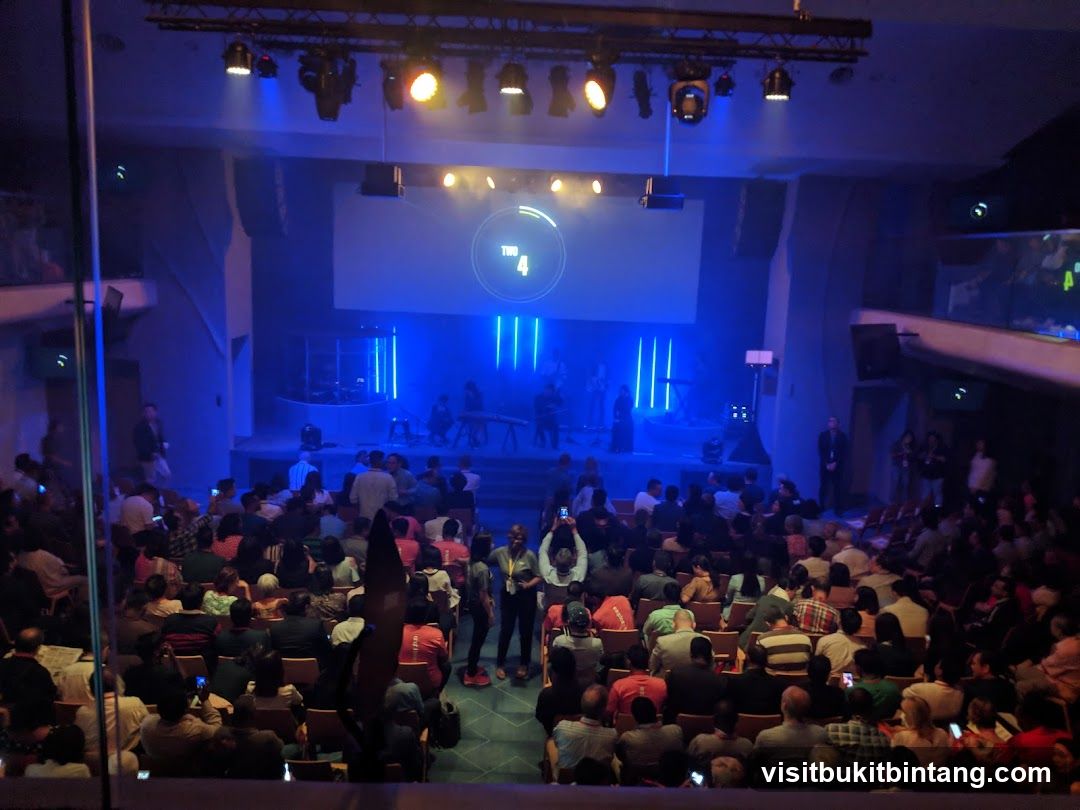 Audience watching a performance on stage