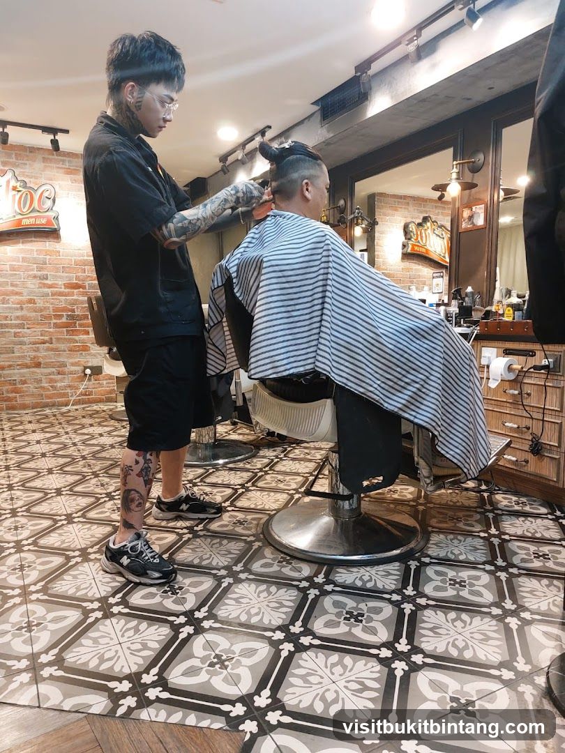 Barber cutting client's hair