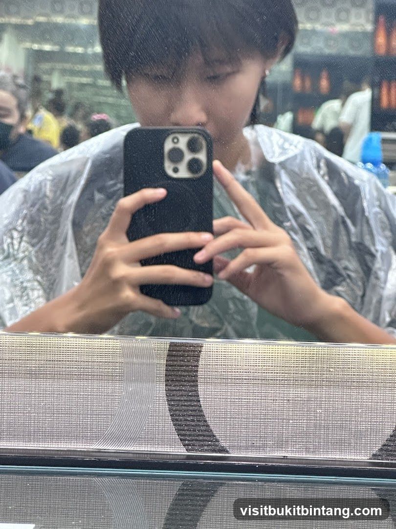 Person taking a selfie in a salon