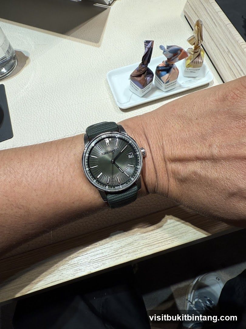 Watch on wrist with chocolates