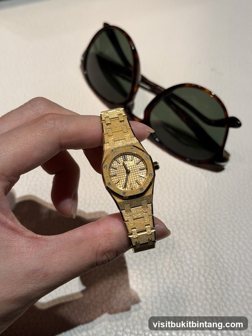 Gold Watch and Sunglasses