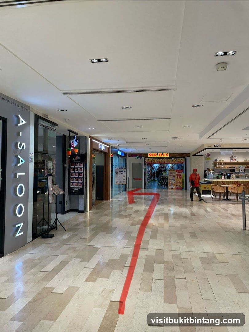 Mall Interior with Shops and Directional Arrow