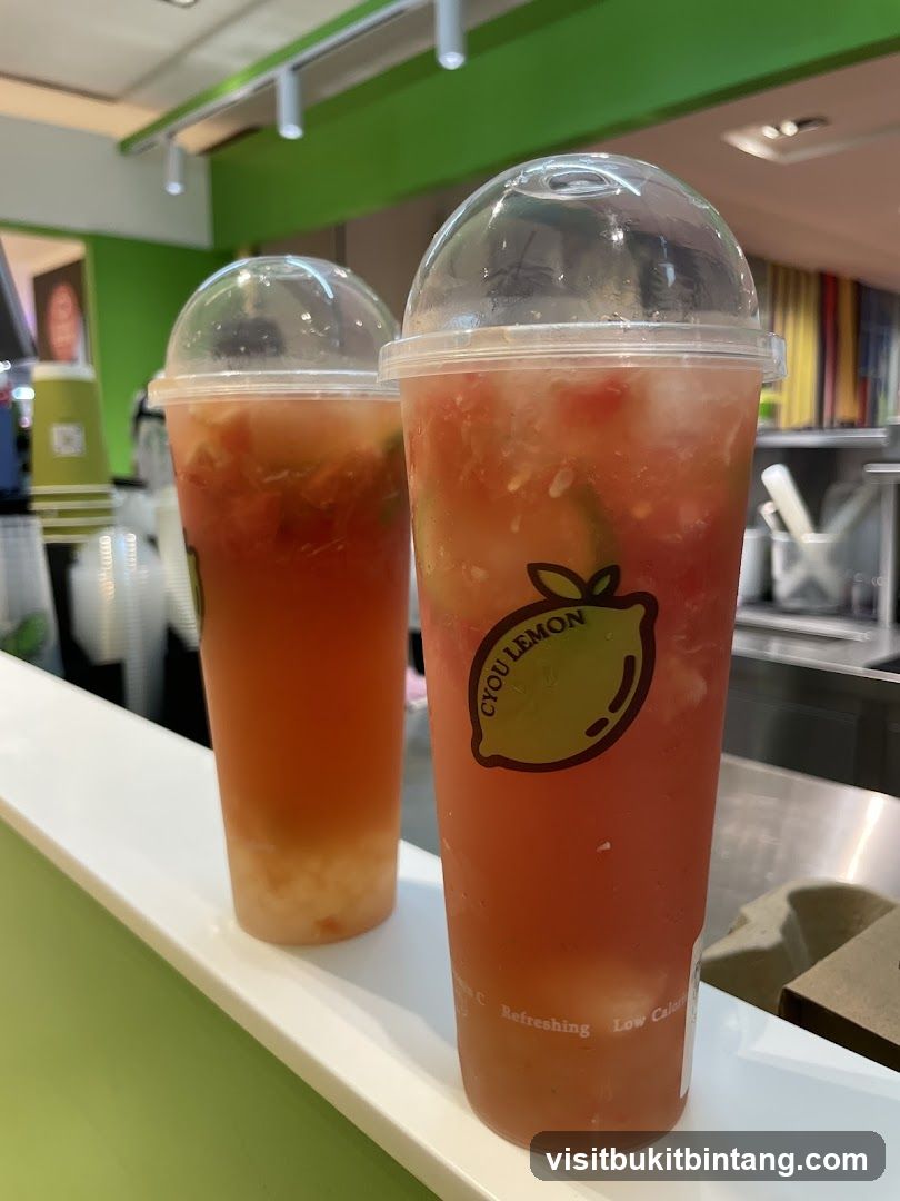 Two fruit drinks with logo