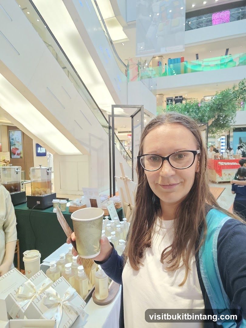 Woman holding a cup at a market stall