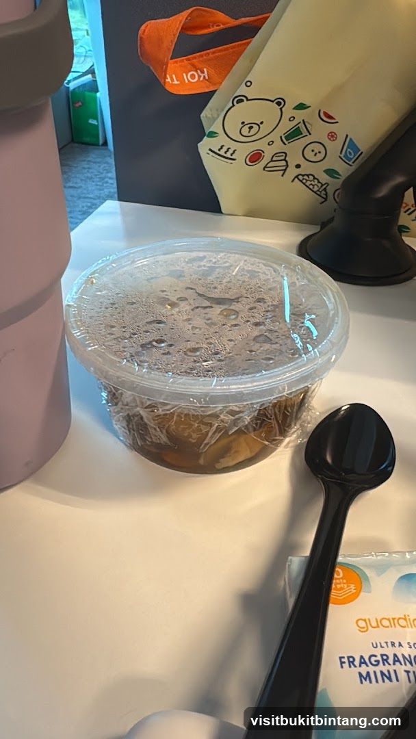 Food container with spoon and tissues