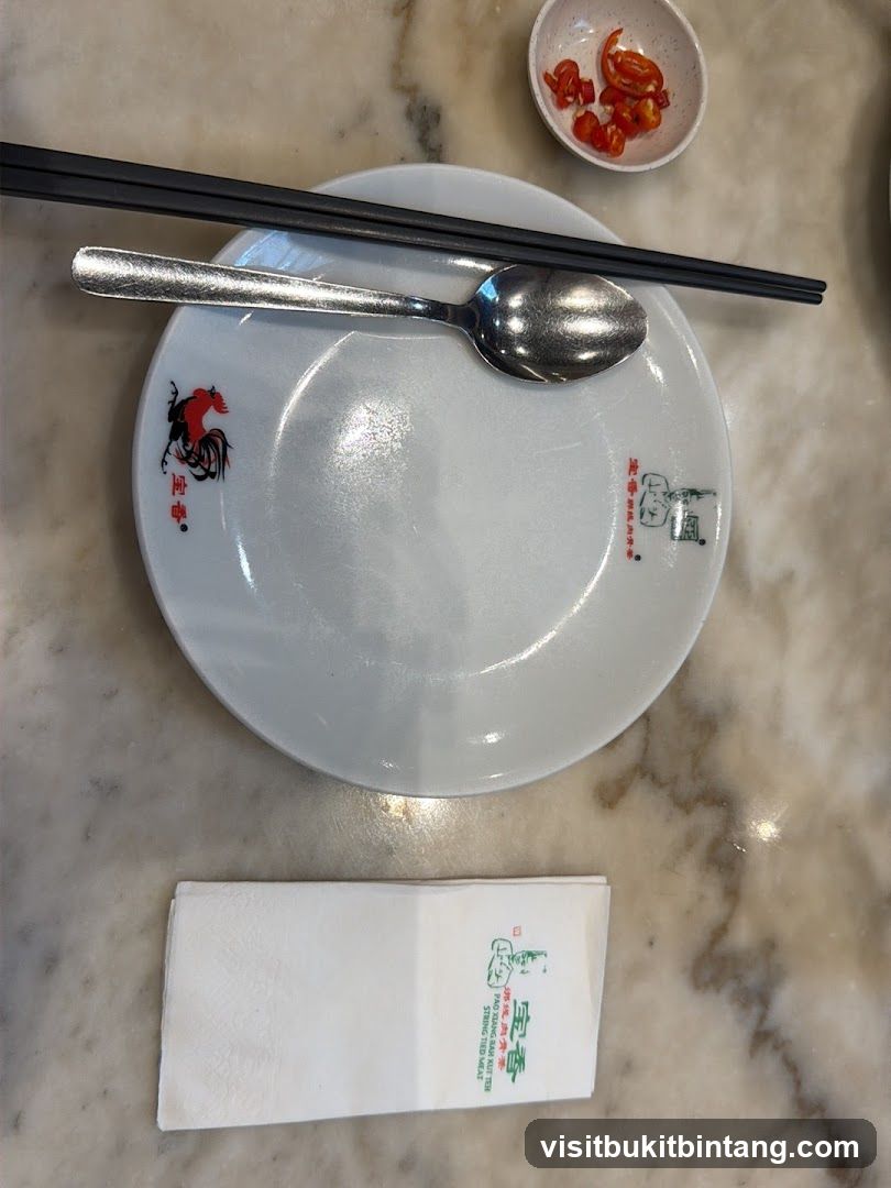 Table Setting with Chopsticks, Spoon, Plate, and Napkin