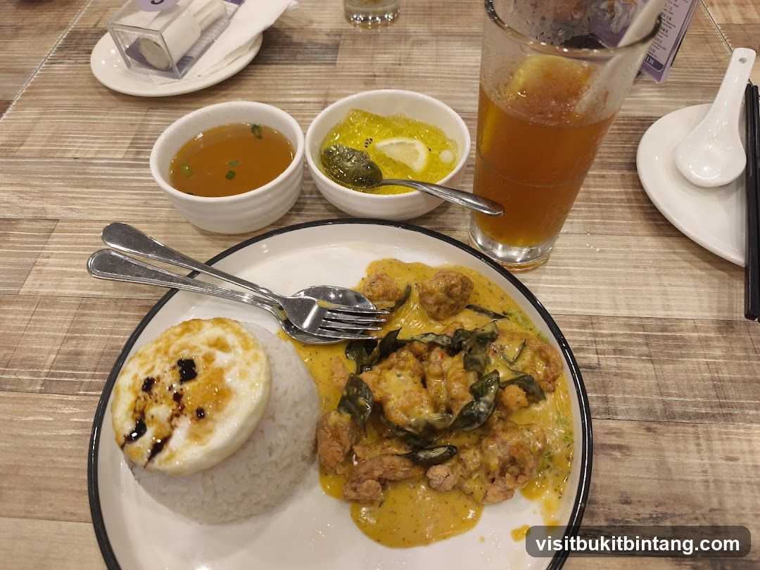 Curry Chicken Rice with Fried Egg and Drink