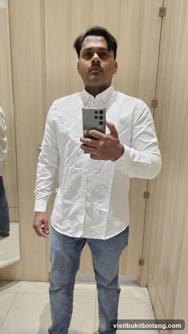 Man in a white shirt and jeans