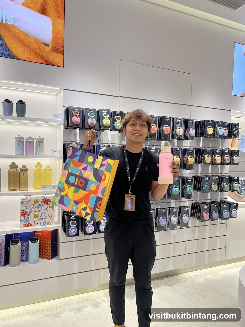 Man holding shopping bag and water bottle in store