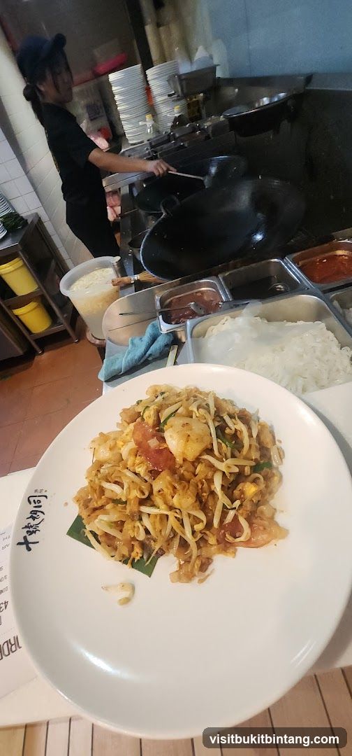 Cook preparing food in a kitchen