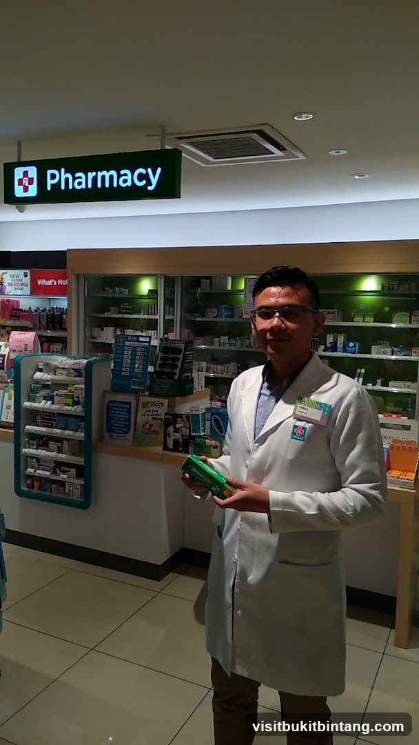Pharmacist holding a product
