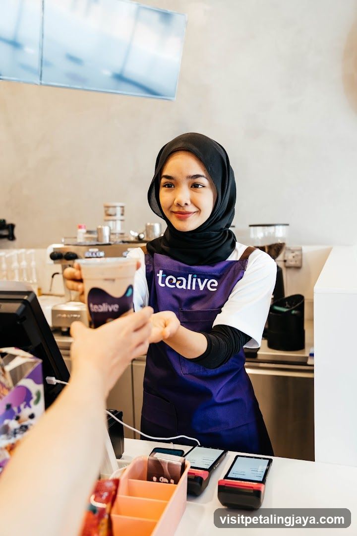 Tealive Staff Serving Customer